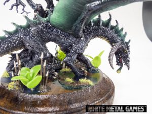 Ebonwrath is mounted to a scenic base on wooden plinth; a display/playable figure.
