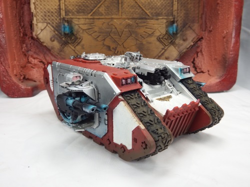 This landraider was touched up, weathered, and given some OSL love!